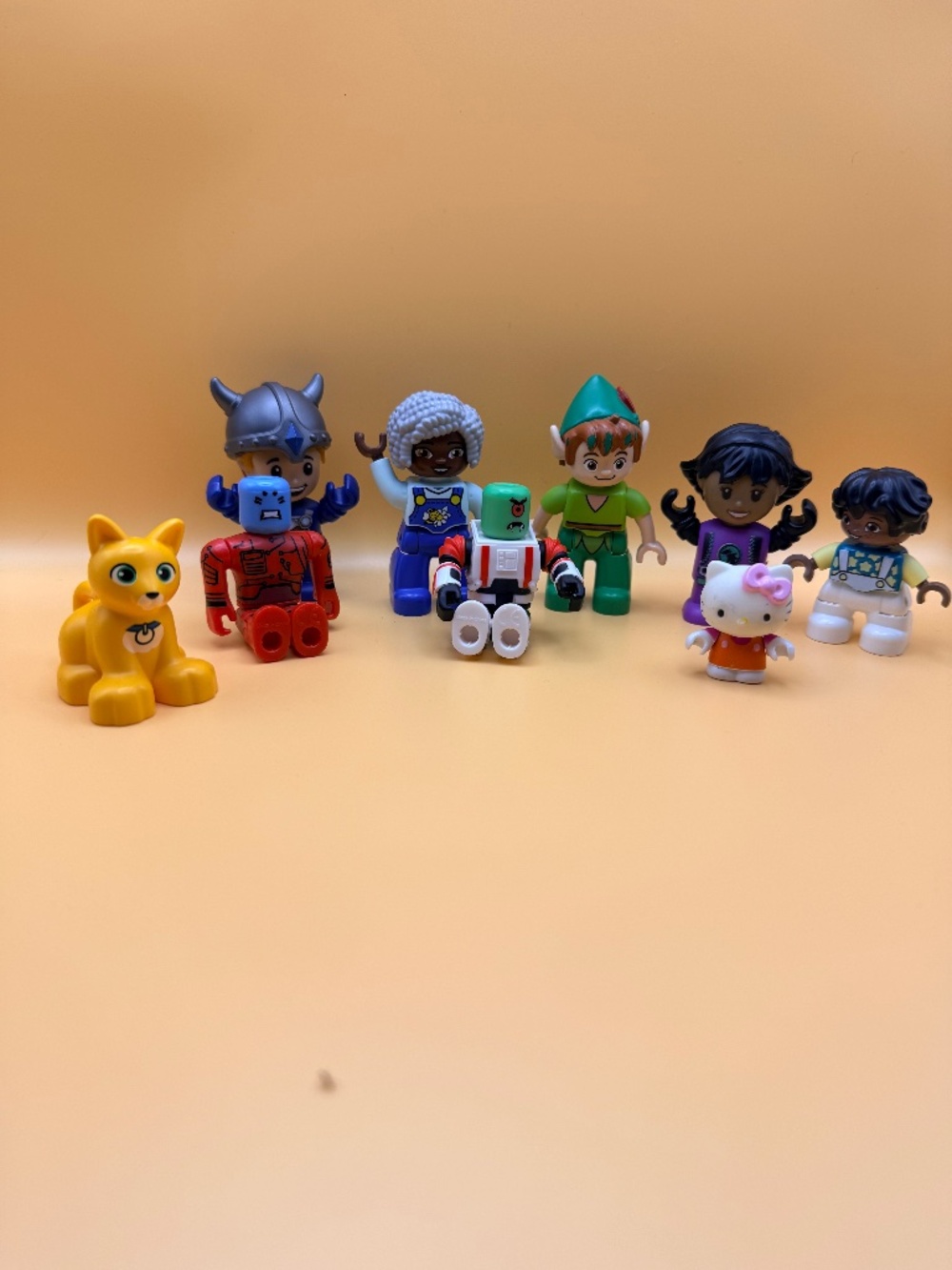 Mixed Character Figures Lot Hello Kitty Peter Pan LEGO Duplo Toys